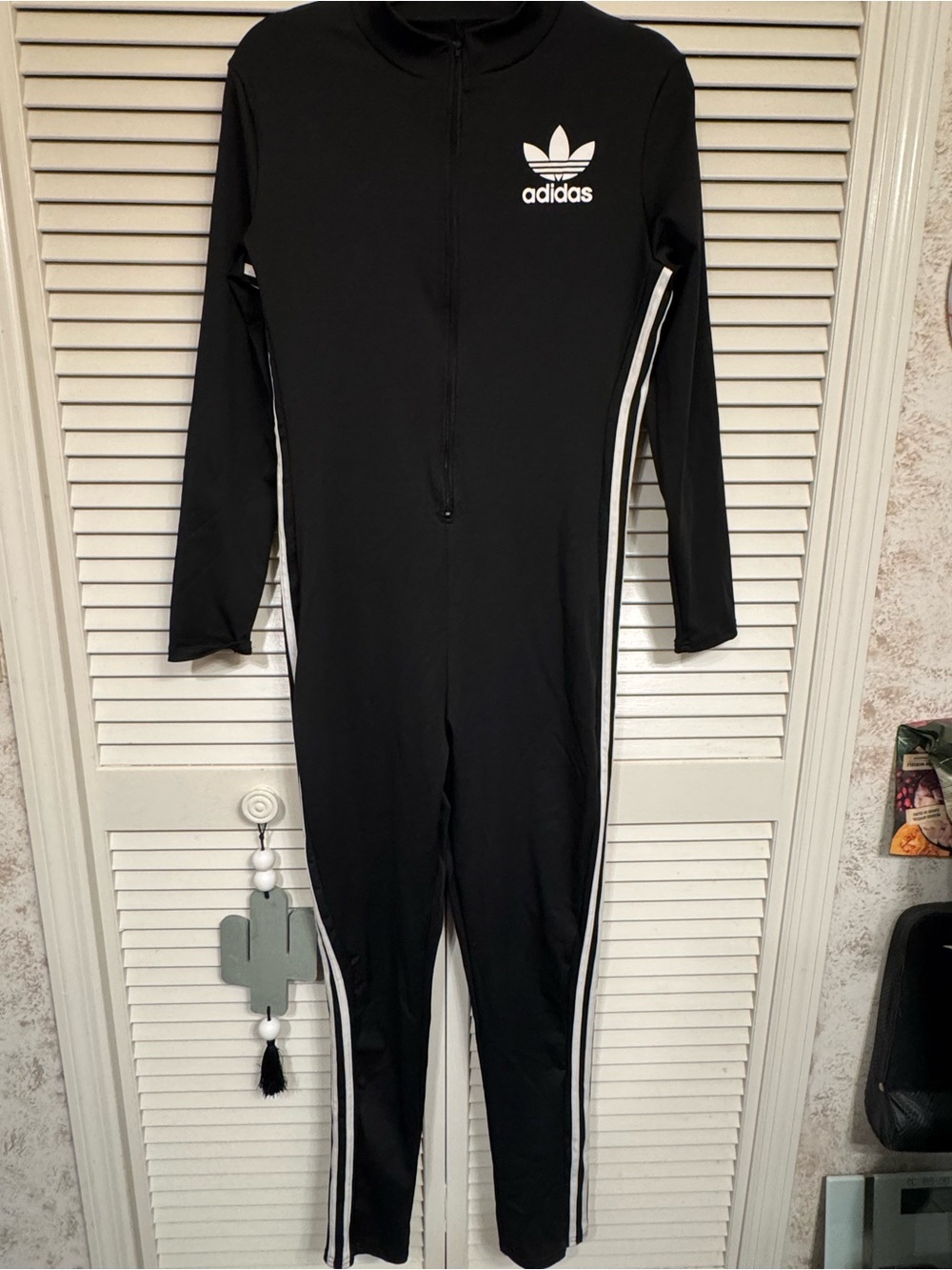 Adidas Women’s Black One-Piece Jumpsuit with White Stripes size large